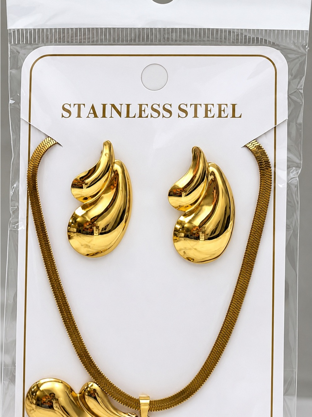 Polished Gold Stainless Steel Sculpted Necklace & Earring Set